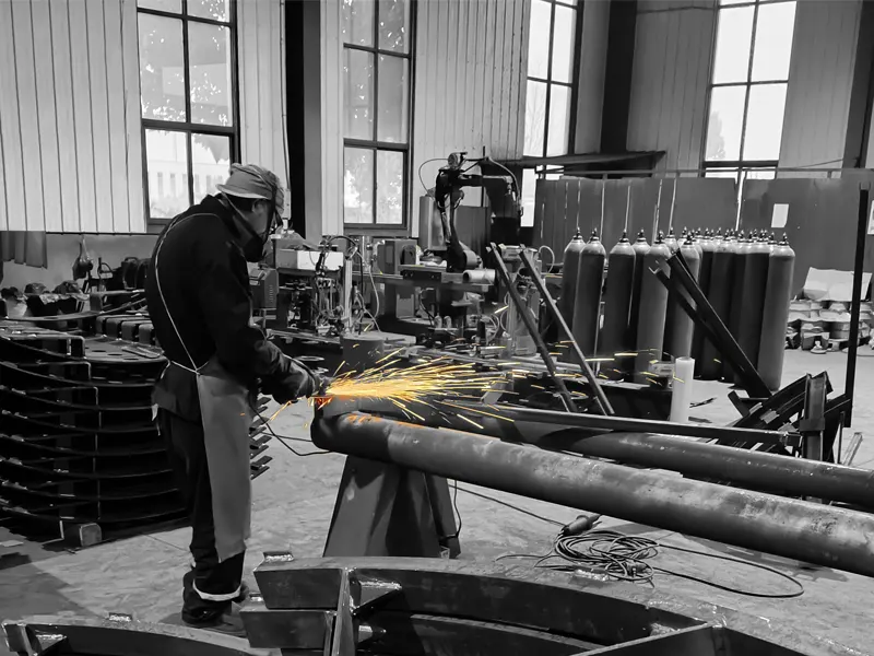 Technicians working on rail components in a certified rail supplier’s workshop