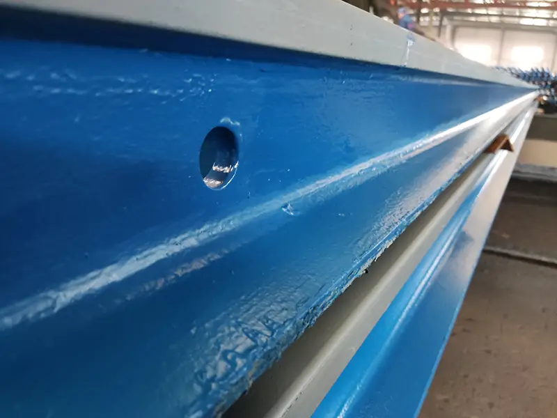 54E3 rail web hole punching