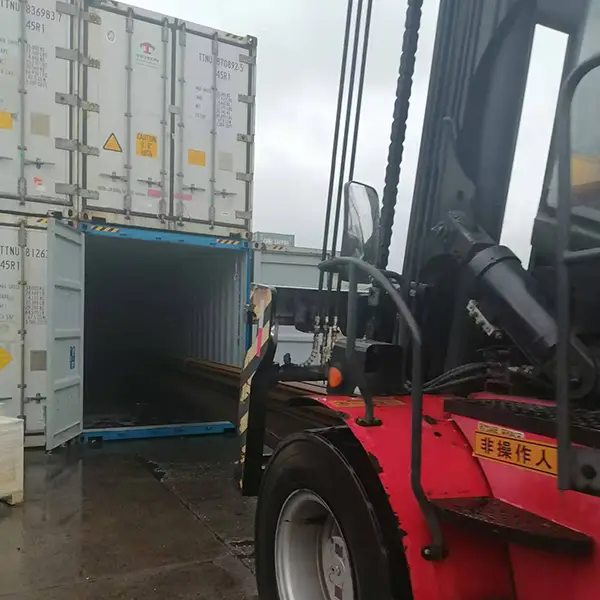 Rail track being loaded with forklift