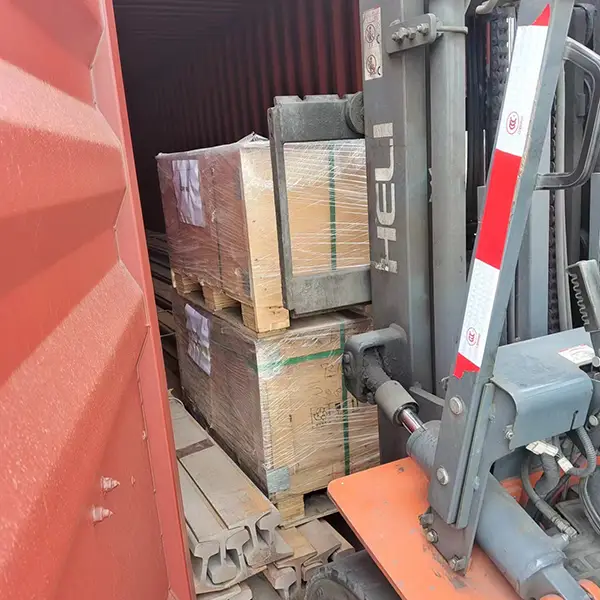 Forklift moving heavy steel sections