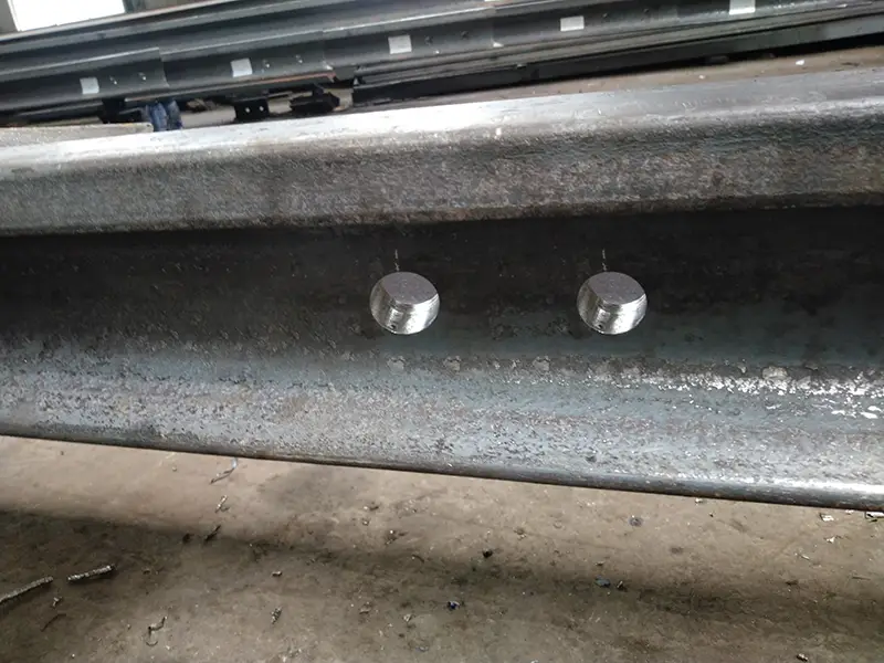 Drilling holes on heavy steel section