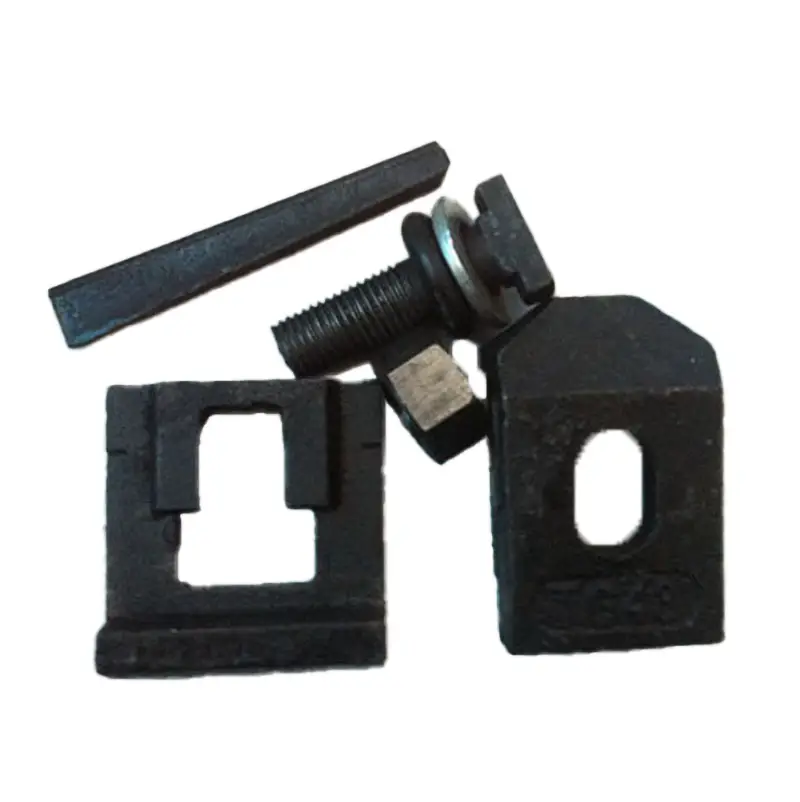 Close-up of TG43 rail clamp components including base plate and T-bolt connection