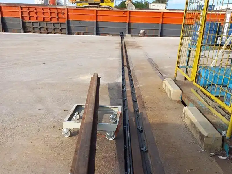 Rail placement process with alignment pads at port site