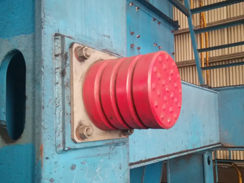 crane buffers absorbing kinetic energy and reducing vibration