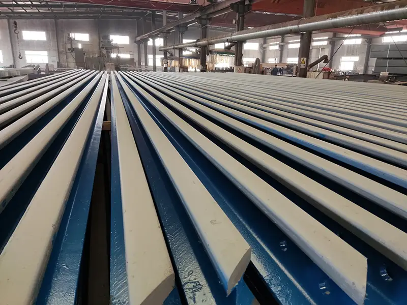 P50 rail with protective coating for corrosion resistance