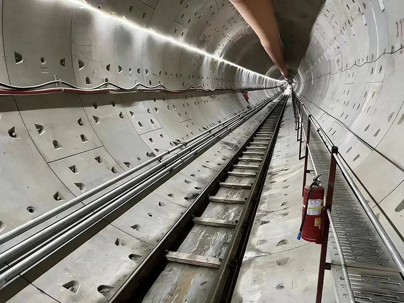 Integrated Rail System with Walkway in Tunnel