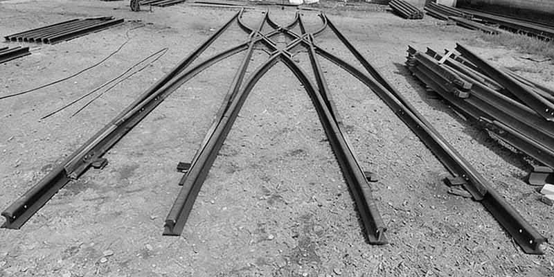 Three-way Turnout for Compact Mining Rail Systems