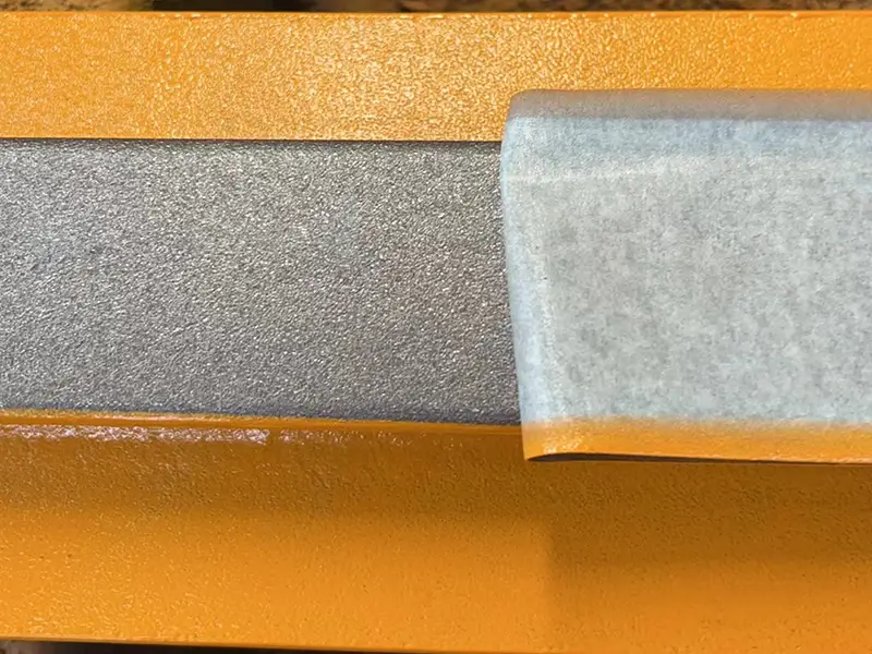 Exposed rail head base material