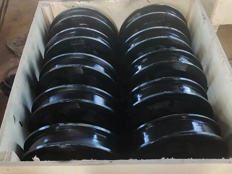 Heavy-duty kiln bogie wheels being packed for export