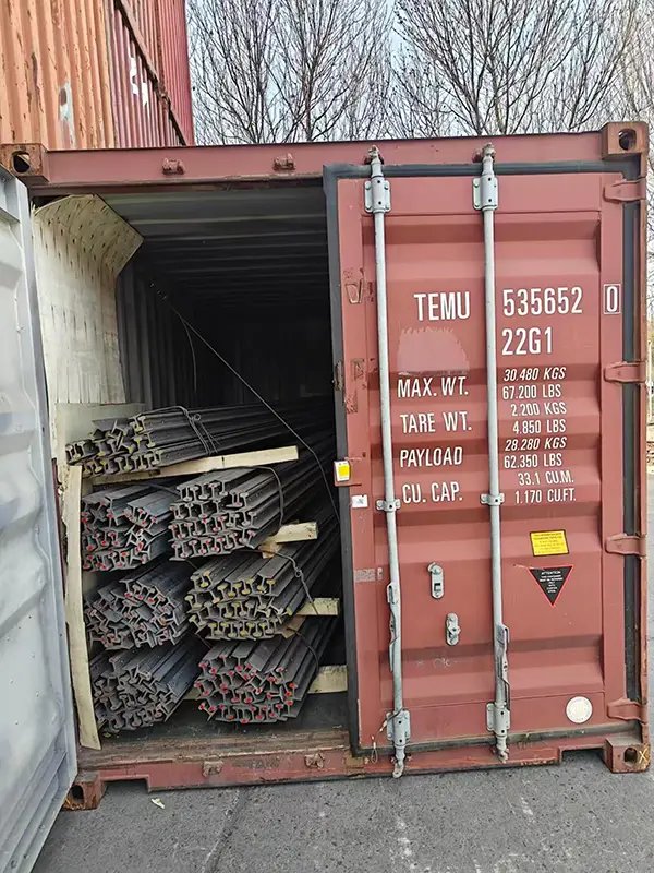 12kg steel rails secured inside containers for USA shipment