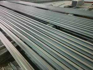 Ship crane rail with anti-corrosion coating