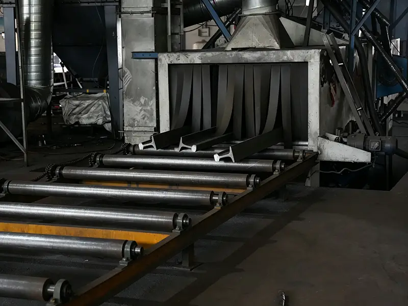 115RE rail processed by a shot blasting machine