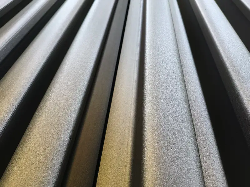Detailed texture of blasted rail surface for coating adhesion