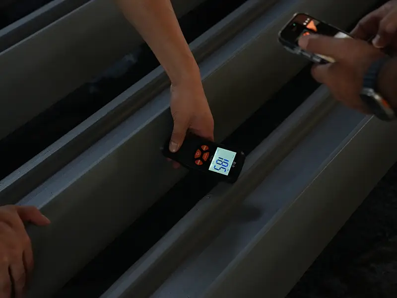 Dry film thickness inspection of intermediate rail coating layer