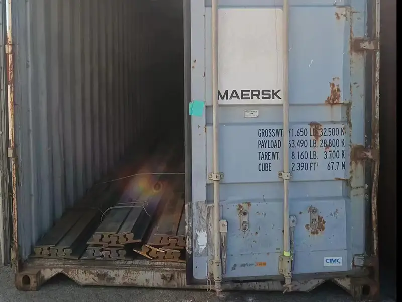 A55 rail loaded in a container for shipment to Saudi Arabia