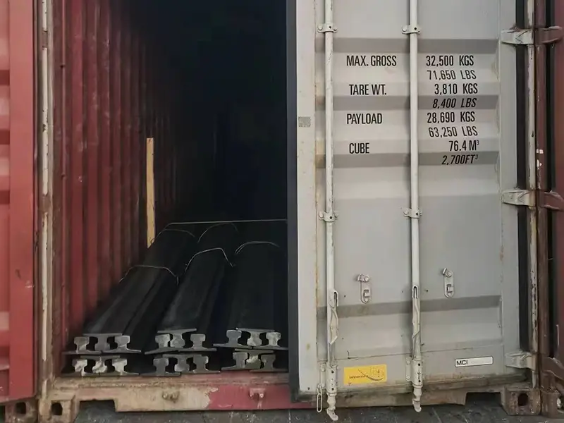 A75 crane rails loaded and secured in a shipping container before shipment to Vietnam