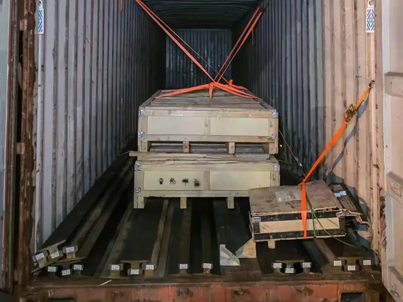 A75 and A100 crane rails with crane wheels secured in a shipping container for delivery to Iceland