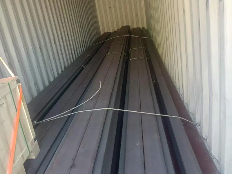 CR100 rail bundles secured with steel straps and blocks
