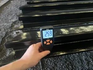 Dry film thickness inspection of painted crane rail
