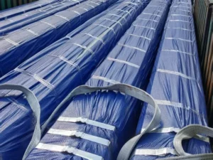 A100 crane rails wrapped in blue film and steel straps