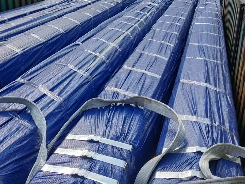 A100 crane rails wrapped in blue film and steel straps