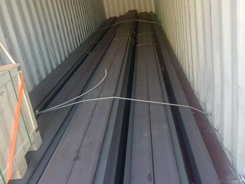 Crane rails loaded in a container